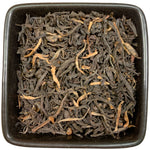 Assam TGFOP1 (Tippy Golden Flowery Orange Pekoe) aus dem Teegarten Bootachang. Volle aromatische Tasse, würzig und tippyreich. Dieser kraftvolle Assam ist besonders am Morgen, auch gerne mit Sahne und oder Kandis, eine gute Empfehlung aus der TeeWiese. TGFOP1= Tee mit dem höchsten Anteil an Blattspitzen.