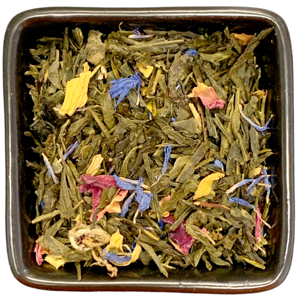 Aromatisierter Grüntee mit blumigem Mango-Geschmack aus der TeeWiese.  Dieser Tee trägt seinen Namen zu Recht. Sanft und feenhaft verzaubert er die Geschmacksnerven. Ein wunderbar blumiger und zarter Geschmack, der durch die Rose noch eine sehr edle Note erhält. Das Ganze auf einer ausgesucht sanften Grünteebasis, macht diesen Tee zu einem sehr eleganten Nachmittags-Tee.