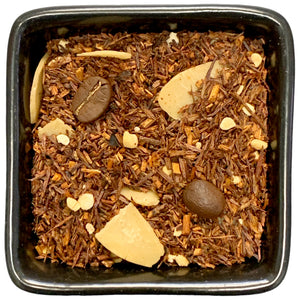 
                  
                    Aromatisierter Rooibos mit Mocca-Mandel-Nuss-Geschmack aus der TeeWiese.  Lass Dir diesen Namen ruhig auf der Zunge zergehen. Mocca-Mandel-Nuss! Dieser Rooibos bringt diese Zutaten perfekt zusammen. Cremiger Mocca Geschmack trifft auf Mandel und Krokant. Das klingt nach Leckerschmäcker und das ist auch einer.
                  
                